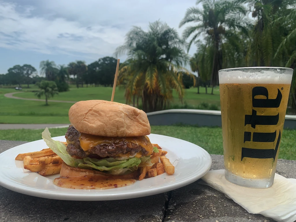 One of our delicious burgers paired with a beer